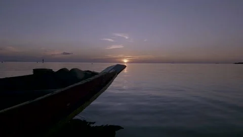 Boat floating in the sunset 動画素材 138667227