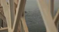 Boat floating under a bridge in Sri Lanka HD Footage