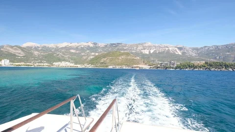 Boat is Floating on the Waves and Leaves a Trail in the Red Sea 動画素材 95927453
