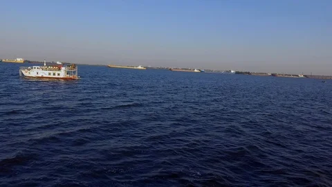 Boat floats on the background of barges Video stock 96003022