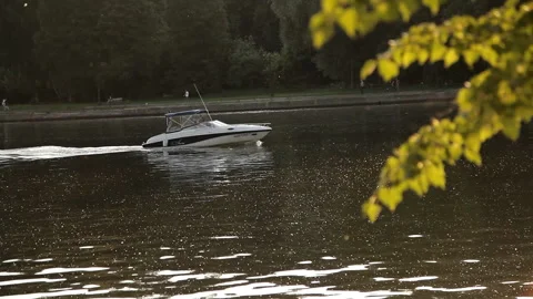The boat floats on the river at sunset Stock Footage 110791111