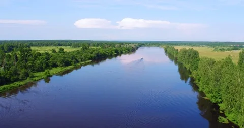 Boat floats on the river, view from above. aerial shot Stock Footage 78396382