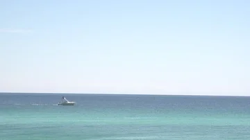 Boat on Florida Beach Ocean Stockbeeldmateriaal 85524218