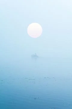 Boat in fog Stock Photos