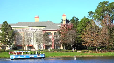 Boat on a front of nice building on a shore. Stock Footage 60120988