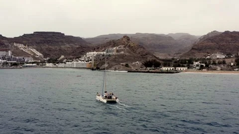 Boat in front of Tauro beach. Gran Canaria. Canary Islands. Drone. Aerial. Video stock 199488227