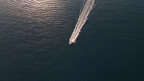 Boat At Full Speed In Blue Ocean 4K Areal Stock Footage 249907146