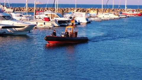 Boat of the German Bundespolizei oder German Police and Zoll is driving around Stock Footage 172215873