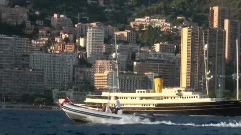 Boat going at a fast speed with couple riding it Stock Footage