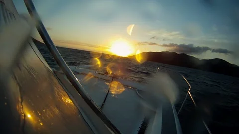 Boat going fast at sun set water splashing on front of the boat. Stock Footage 145840991