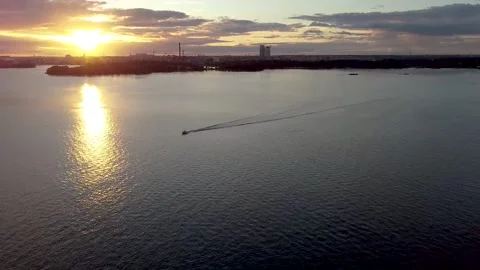 Boat going by at sunset Video stock 166416808