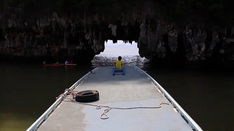 Boat Going Through a Cave in Phang Nga Bay, Thailand Stock-Footage 84293345