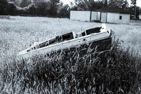Boat in grass Stock Photos