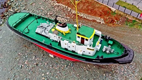 Boat on the ground with a flag on top Stock Footage 268935788