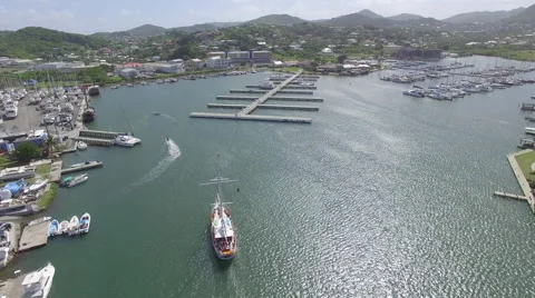 Boat heading towards harbor - St Lucia Stock Footage 61847269