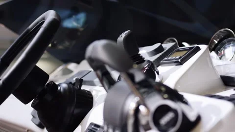 Boat Helm With Steering Wheel and Throttle Levers, Yacht Cockpit, Close Up Pan Stock Footage 340329744