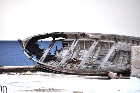 Boat with a hole Photos