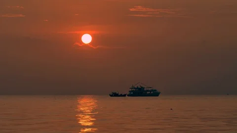 Boat on a horizon, Romantic sunset at seaside. Stock Footage 123735984