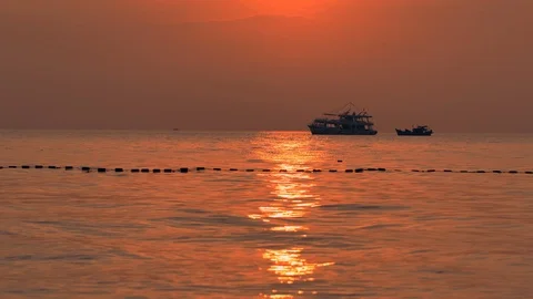Boat on a horizon, Romantic sunset at seaside. Stock-Footage 123736268