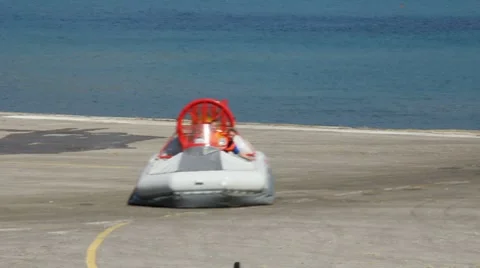 Boat hovercraft u-turn on the beton surface Stock Footage 7135555