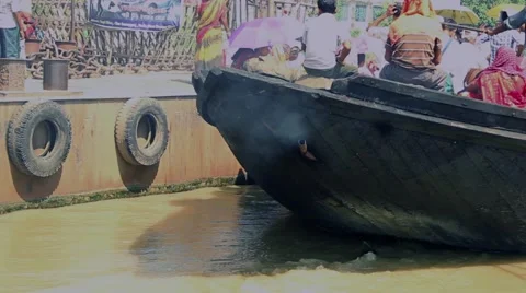 A boat in India pulls away. Shot of the exhaust pipe Stock Footage 58118466