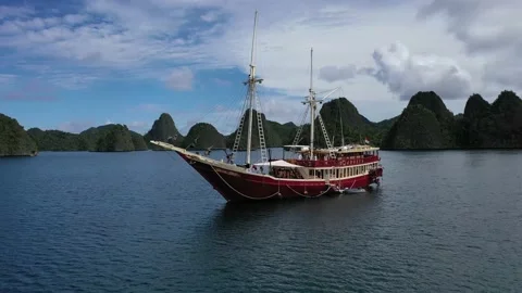 Boat Jump Flip Dive and Swim in Raja Ampat Adventure Summer Live Aboard Stock Footage 197058569