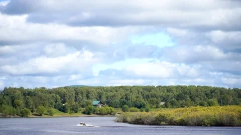 The boat jumps down the river Stock Footage 219973300