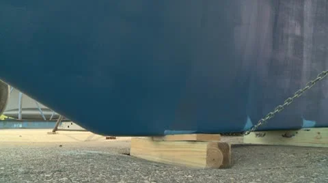 Boat keel lifting off blocks Stock Footage 8923677