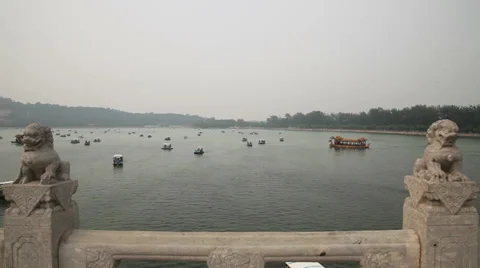 Boat on Kunming Lake, View from 17 Arch Bridge in Summer Palace Stock Footage 36807676