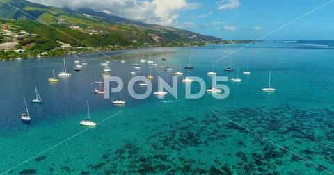 Boat in a lagoon in aerial view, Papeete French Polynesia Stock Photos
