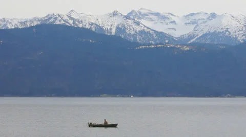 Boat on lake in Alps Stock Footage 22677748