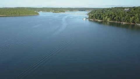 Boat by the lake bridge Stock Footage 107503272