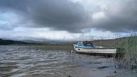 Boat in the Lake Vídeos de archivo 111529674