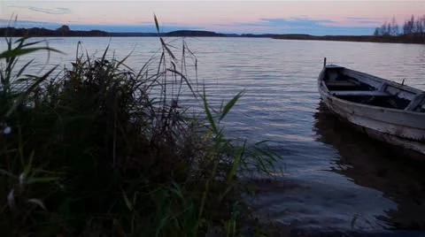 Boat on the lake. sunset. Stock Footage 12461521