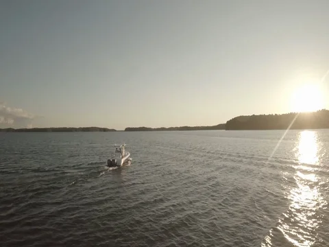Boat on Lake Sunset Stock Footage 77573494