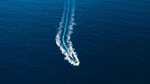 Boat launch at high speed floats in the Mediterranean sea, aerial top view Video stock 113882877