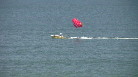 Boat launching a parasail Stock Footage 457340