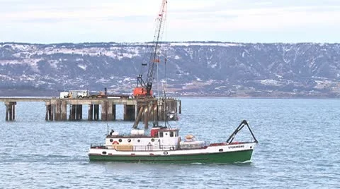 Boat Leaving Harbor with Building Materials 3 Stock Footage 10586193