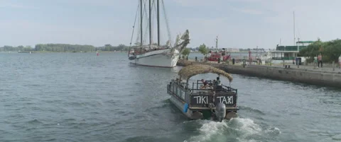 Boat leaving harbor Stock Footage 207830514