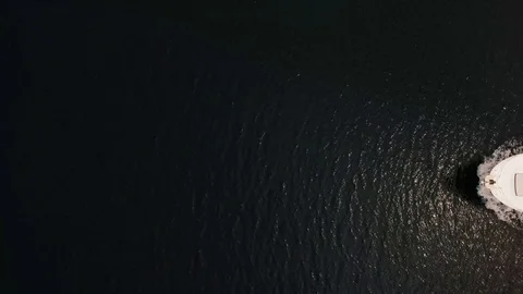 Boat leaving jetty into ocean Stock-Footage 127454688