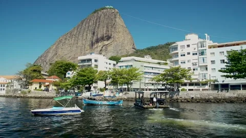 Boat Leaving Pao de Aciucar Stock Footage 265383572