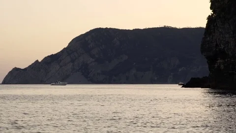 Boat Lost in the Sea at Dusk Stock Footage 79660190
