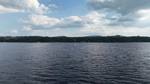 Boat on Lough Derg Under Dramatic Cloudy Sky, Ireland Stock Footage 339743443