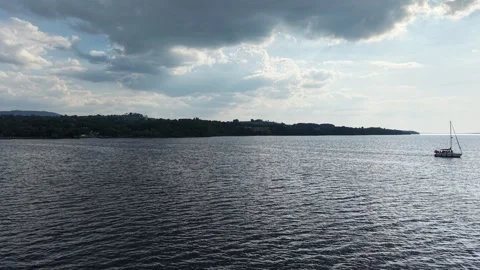 Boat on Lough Derg Under Dramatic Cloudy Sky, Ireland 動画素材 339743619
