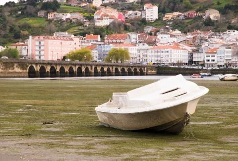 A boat at low tide Stock Photos
