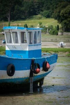 Boat at low tide Foto stock