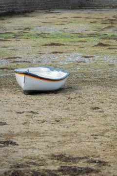 Boat at low tide Stock Photos