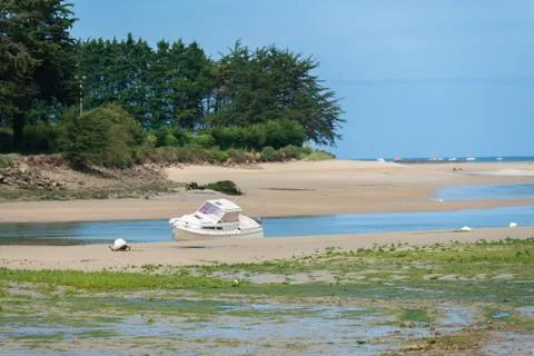 Boat at low tide Stock Photos