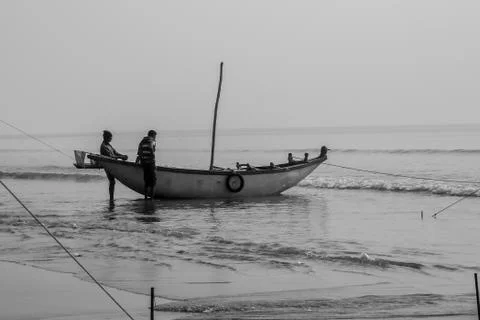 The boat on the low water Stock Photos
