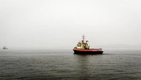 Boat in the mist Stock Photos